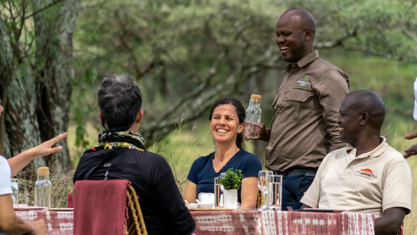 ACACIA FARM LODGE - KARATU, guests at the table