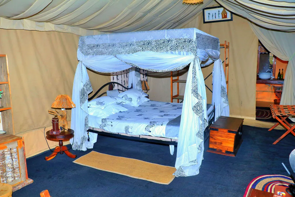 TANZANIA BUSH CAMPS, tent bedroom